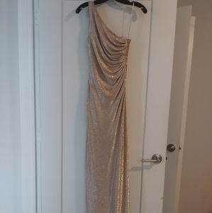 Gold Calvin Klein maxi dress. Size 2, stretch, can fit size 4. I'm size 4-6